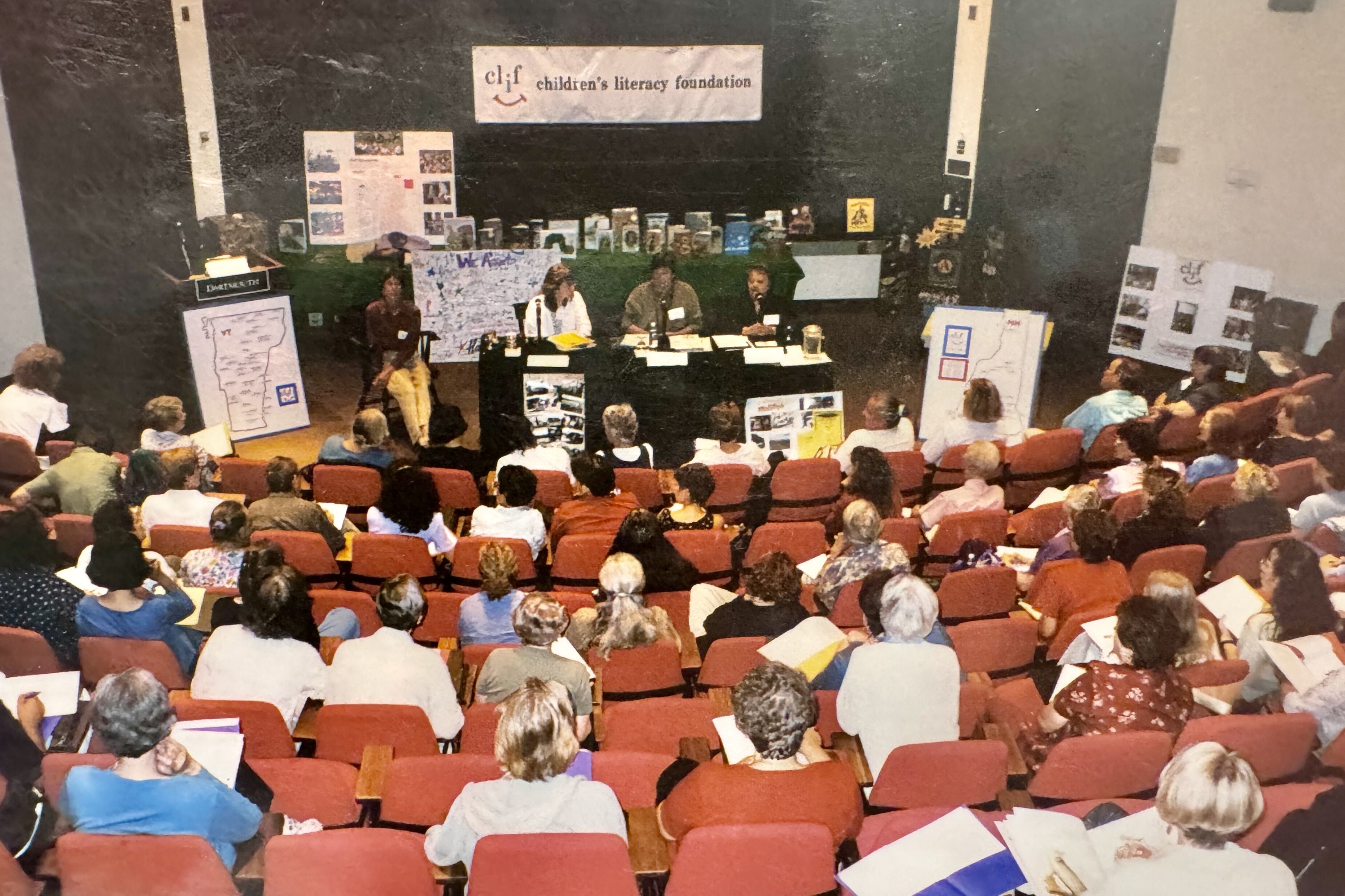 Audience listens to a panel at a Children's Literacy Foundation event.